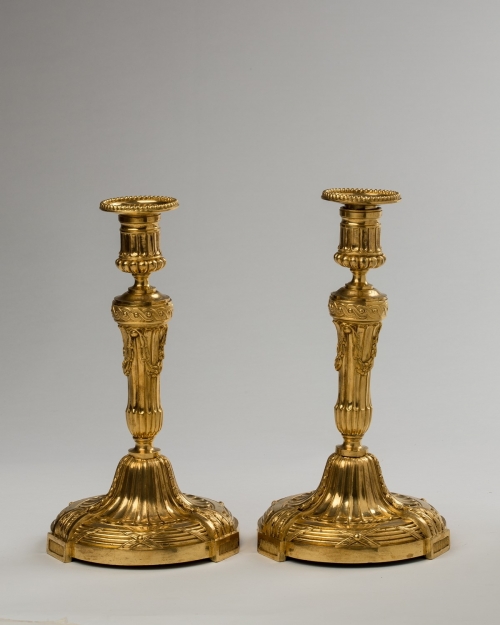 A Pair of Louis XVI Style Ormolu Candlesticks
